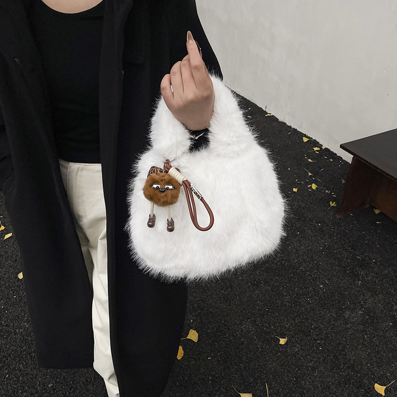 Bolsa de hombro de alto nivel de invierno y otoño versátil para mujeres 2025 nuevo nicho de diseño de estilo de viaje de la bolsa de cubo
