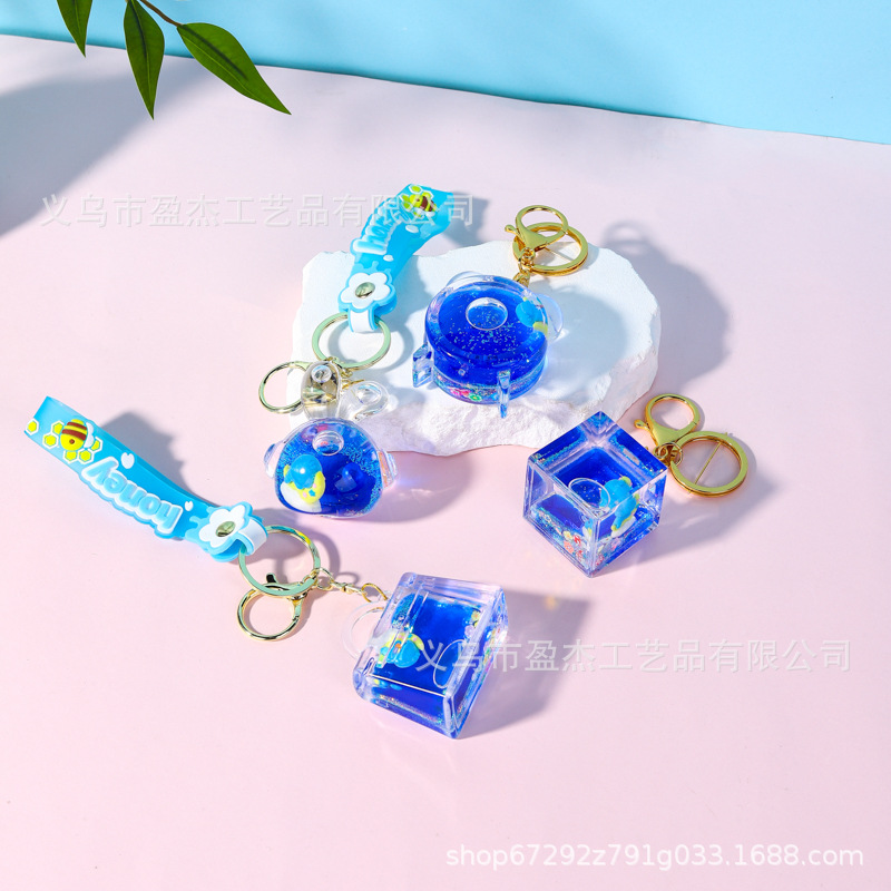 Nuevo acrílico en aceite flotante botella de arena llavero azul mar serie bolsos accesorios colgantes