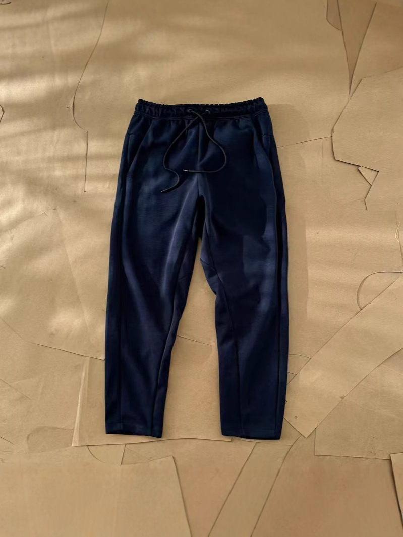 Nuevo hombre deportivo ocio al aire libre versátil punto suelto pantalones largos de piernas largas pantalones 211