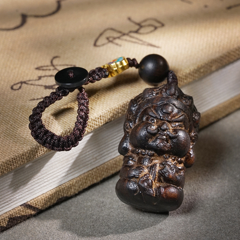 Bodhisattva chess agarwood yellow god of wealth bag pendant car key chain wood carving mobile phone chain men and women agarwood with gifts