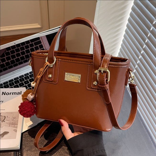 Bolso de moda de alta calidad retro bolso de cubo para mujeres otoño / invierno 2025 nuevo estilo versátil bolso de hombro bolso de mochila coreano