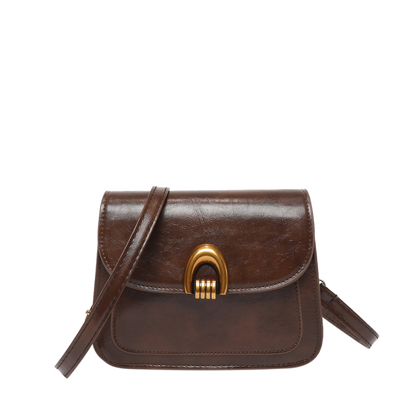 2025 nueva moda temprana primavera bolsa de silla textura casual gran capacidad retrógrada piel de cera de aceite de hombro mochila para mujeres