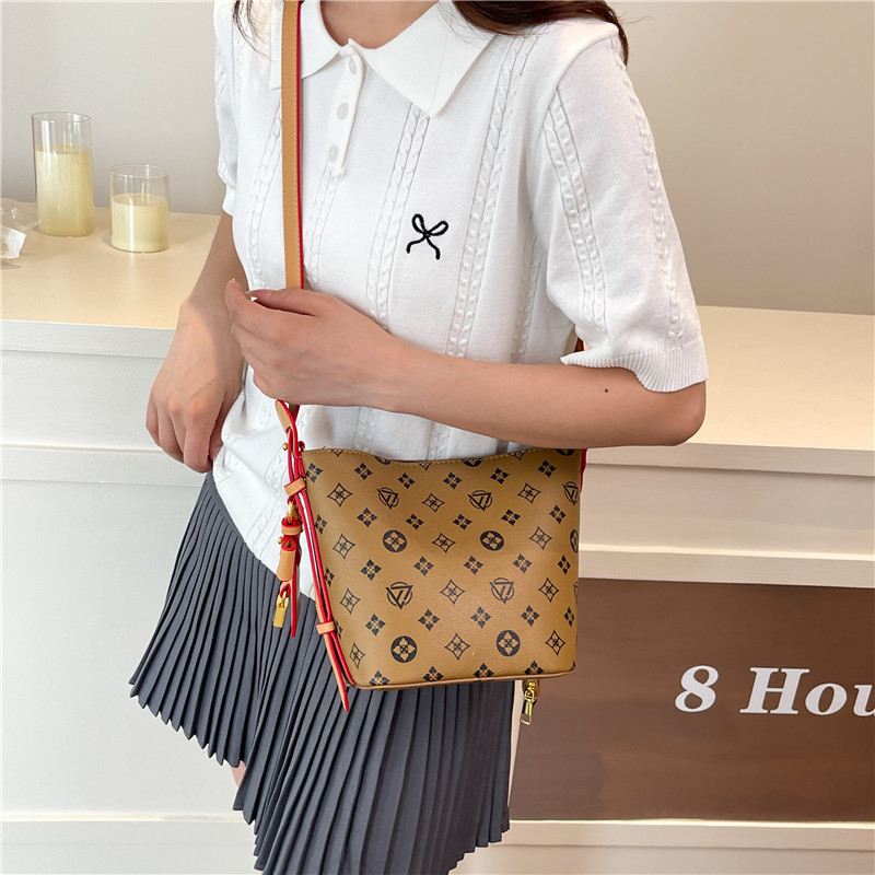 Bolso de cubo retro estilo Hong Kong 2025 verano nuevo bolso femenino personalidad bowknot bandolera moda contraste color bandolera