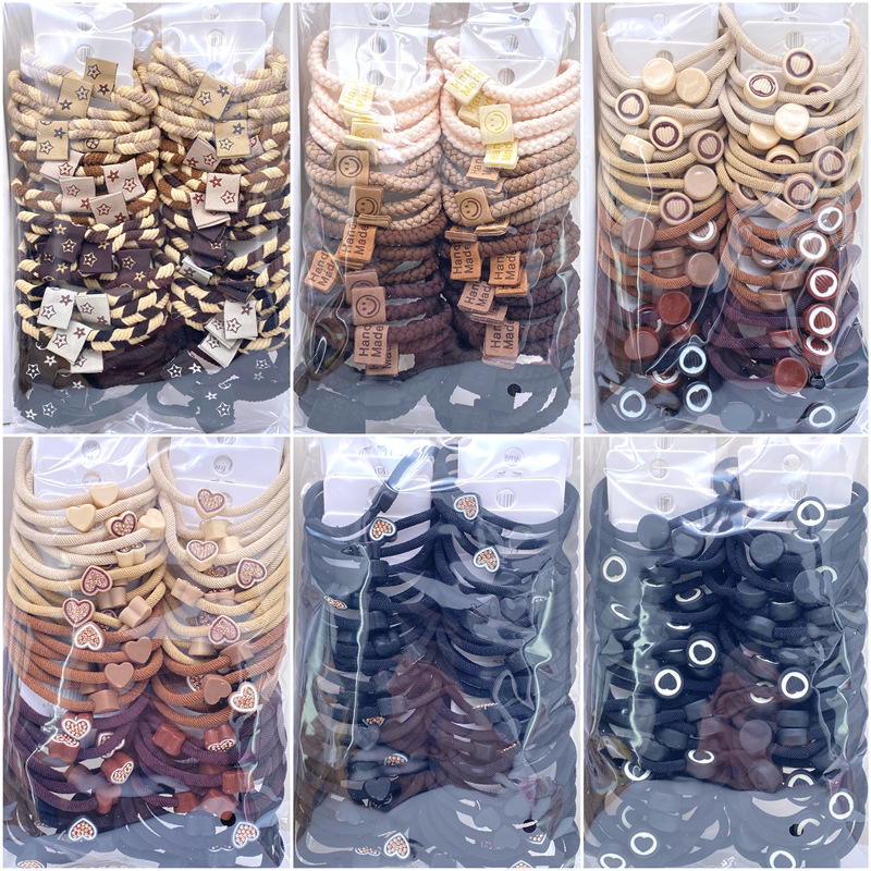 Nuevo hilo amor diamante tarjeta pelo anillo cadena Smiley oso etiqueta de cuero supermercado 2 yuanes tienda accesorios para el cabello cabeza Accesorios