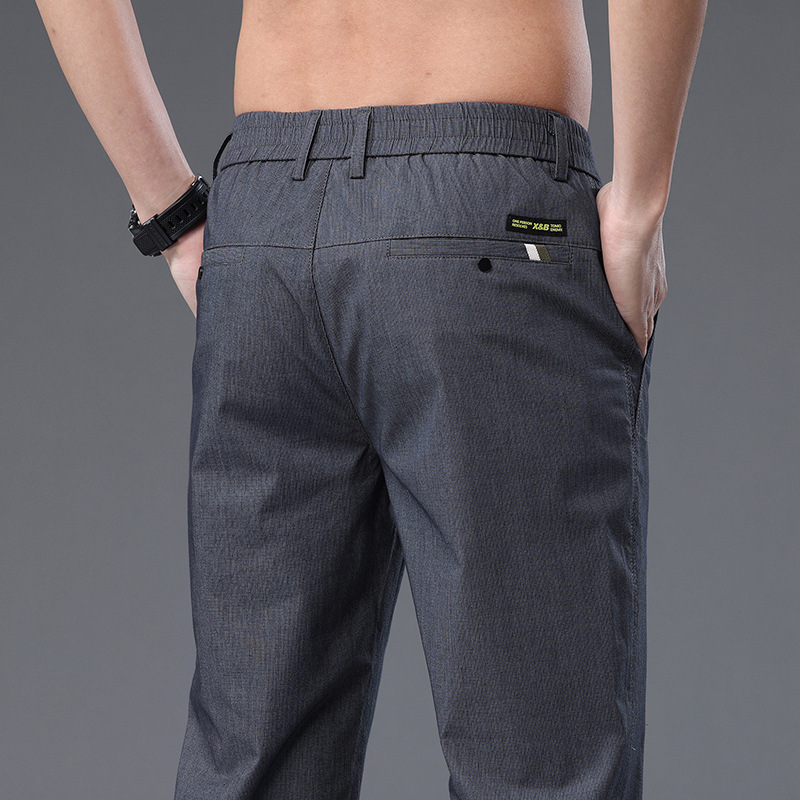 Pantalones casuales de hombre de gama alta primavera/verano 2023 nuevos pantalones de traje casual de negocios verano alto elástico recto sin planchar pantalones de hombre