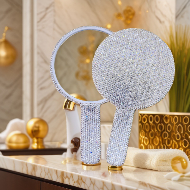 El fabricante suministra espejo de mano de diamante ABS, espejo de mango de arcilla de belleza de alta gama a la moda, suministros de Amazon, espejo cosmético