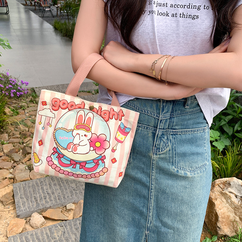 简约卡通手提帆布包女迷你手拎包2024新款上班饭盒袋遛弯小包批发
