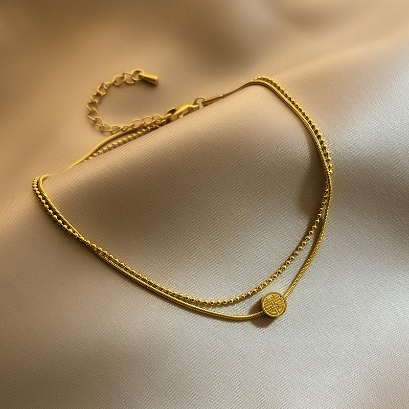 Fuzi doble tobillera sexy femenina versión coreana simple Mori tobillera desnuda personalidad titanio cadena de pie de acero temperamento tobillera neto