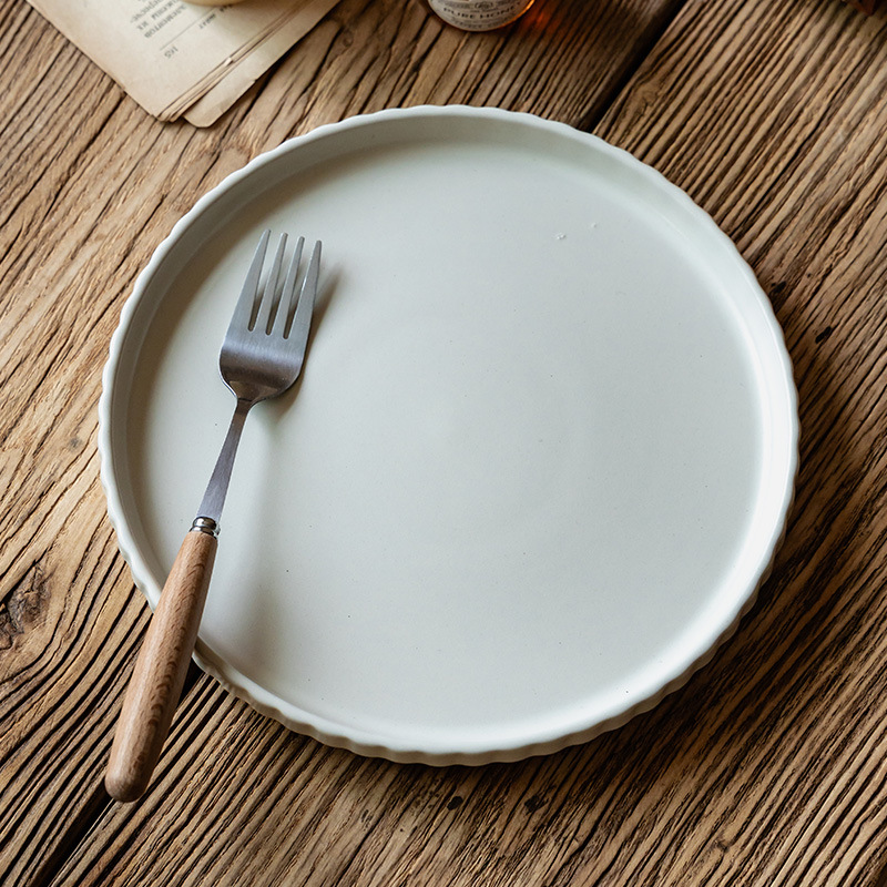 Plato básico de filete de color sólido Plato de cerámica en relieve Plato de cocina casera al por mayor Plato de vajilla de alta calidad Plato de cena occidental