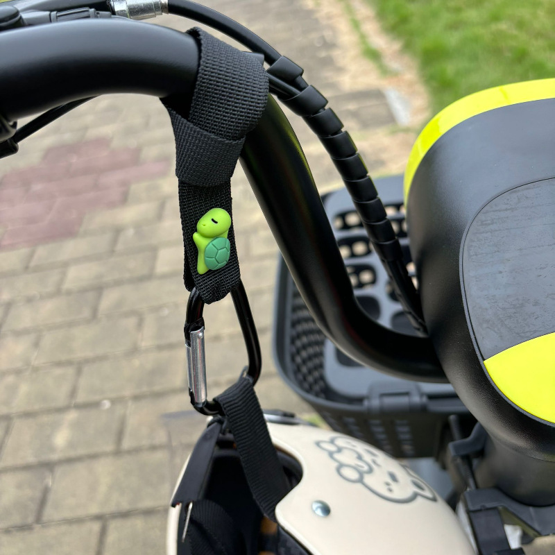 Gancho para coche eléctrico delantero universal sin perforaciones, almacenamiento multifuncional, batería, casco de bicicleta, bloqueo, dibujos animados lindos