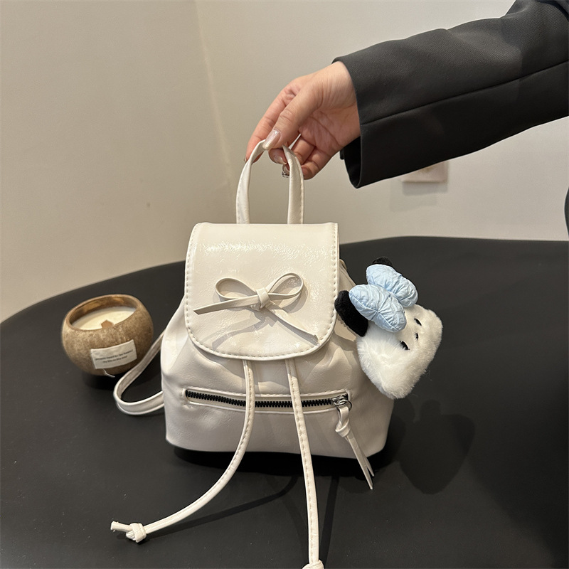 Mochila de nicho coreana para mujer, verano 2024, nueva mochila de moda, bolso de cubo portátil de un solo hombro de todo fósforo