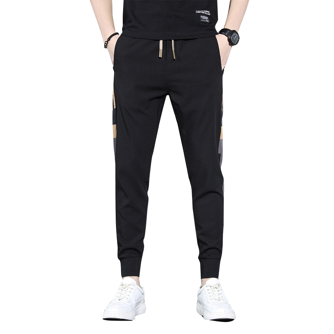 Pantalones deportivos de primavera y otoño sueltos para hombres 2023 nuevos pantalones largos casuales versátiles marca de moda de primavera pantalones harén atados al tobillo