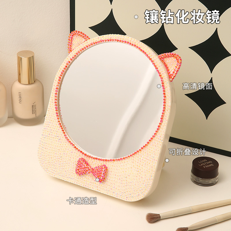 Espejo de maquillaje de escritorio de plástico ins espejo de maquillaje de niña almacén de arco espejo plegable lindo gato oídos espejo