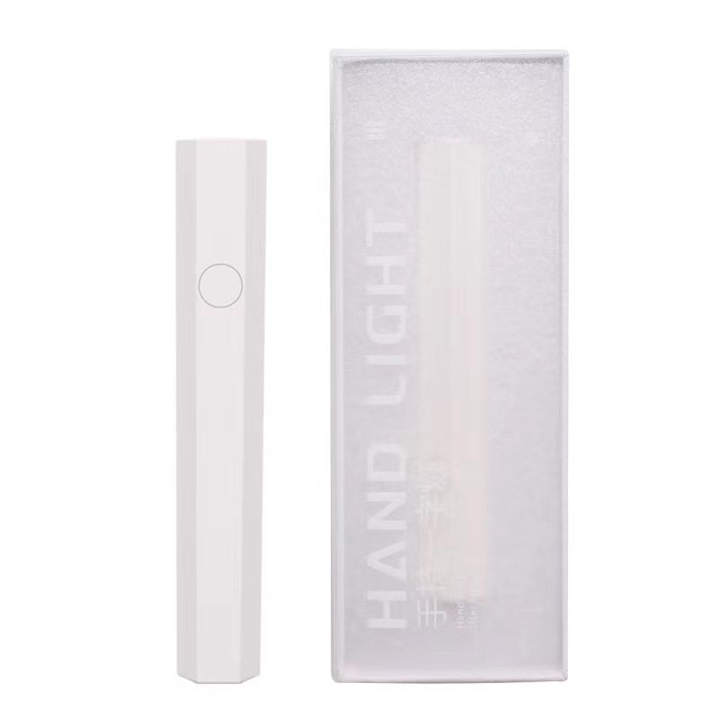 Nueva Luz de mano de una sola palabra Luz Portátil de fototerapia de salón de uñas mini Luz de almacenamiento de energía pegatina de uñas decoración de diamantes Luz de cocción