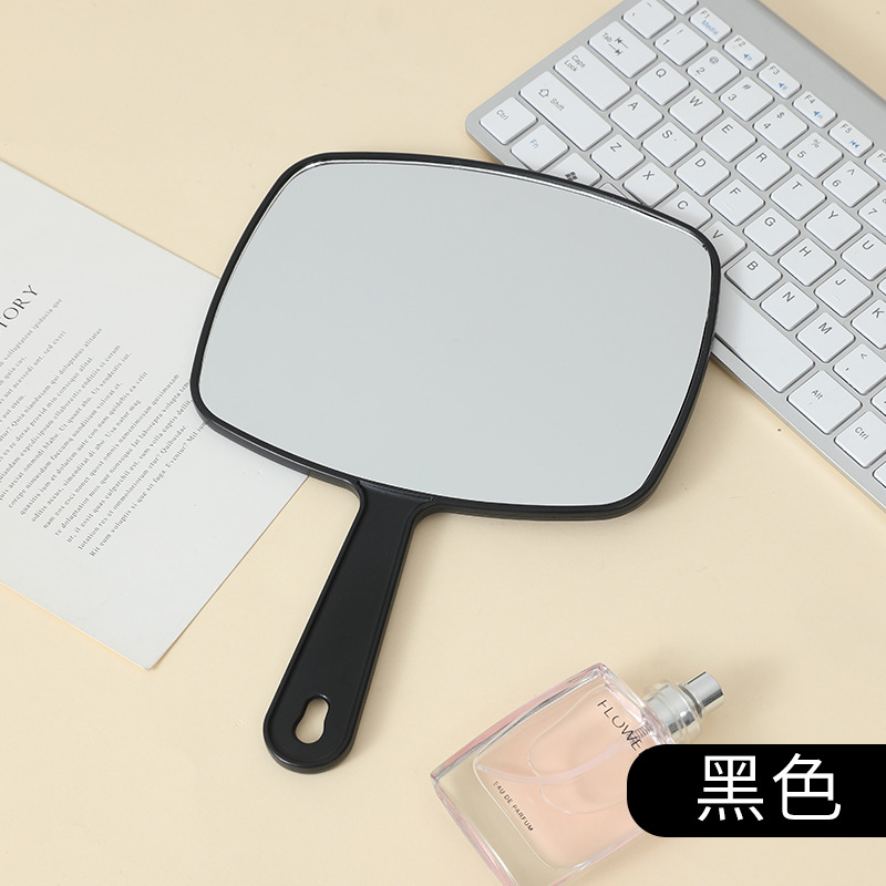 Espejo de maquillaje portátil de gran tamaño multifuncional colgante color sólido HD belleza mango espejo fábrica al por mayor