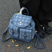 Tagi.《i》新款抽绳包双口袋流苏大容量束口双肩包