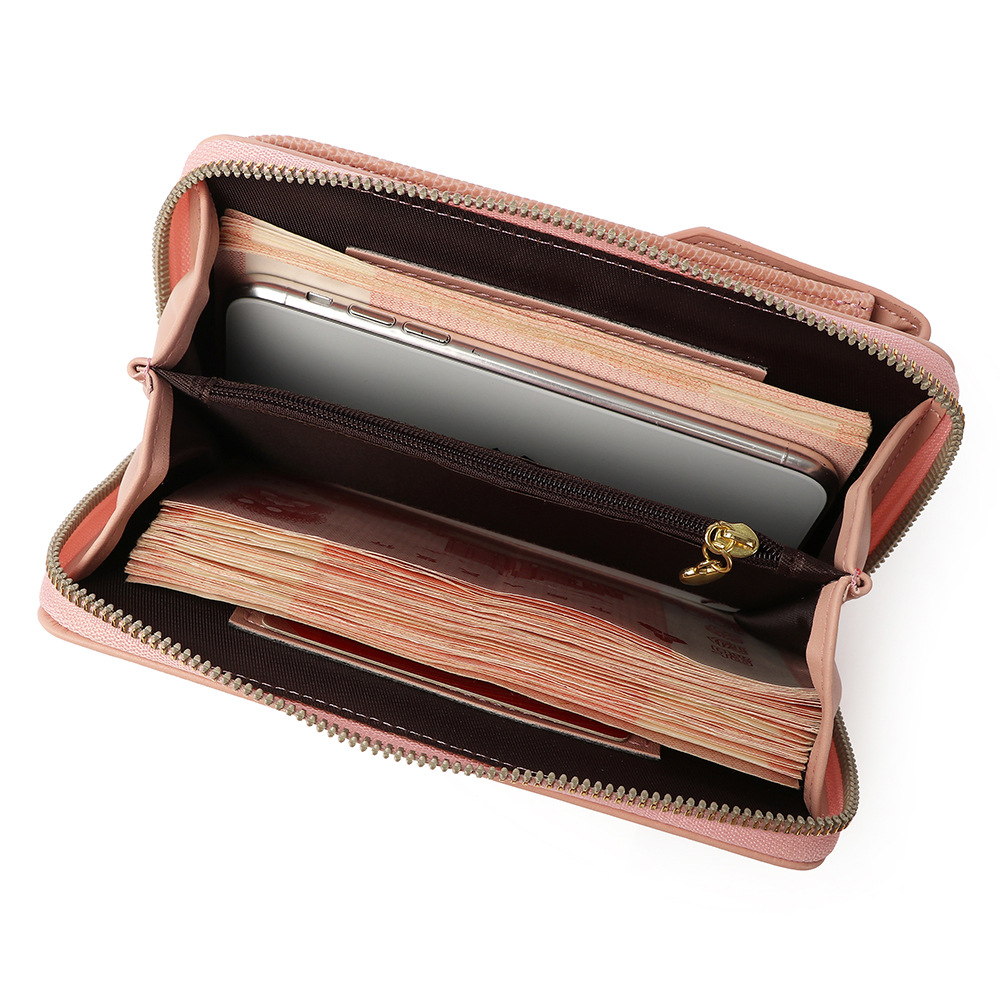 Suministro transfronterizo 2021 nueva bolsa de teléfono móvil para mujer billetera con cremallera vertical patrón de serpiente versátil bolso de hombro crossbody de estilo coreano