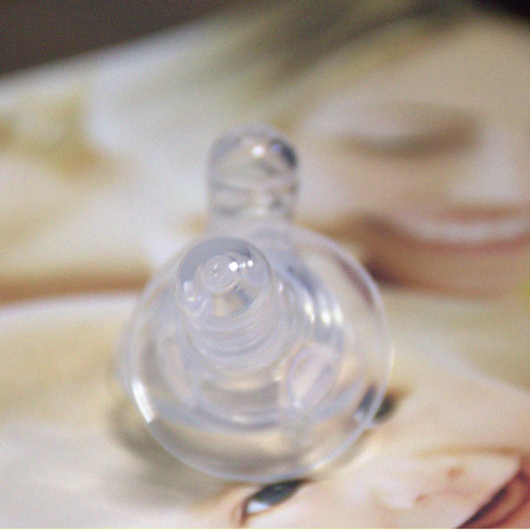 Venta directa de fábrica de pezón de silicona de sentido real Leche materna espiral de boca ancha bebé