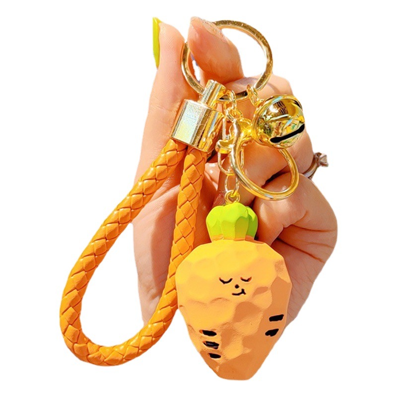 Nueva resina geométrica cebolla ajo rábano llavero moda femenina Linda exquisita muñeca llavero mochila colgante