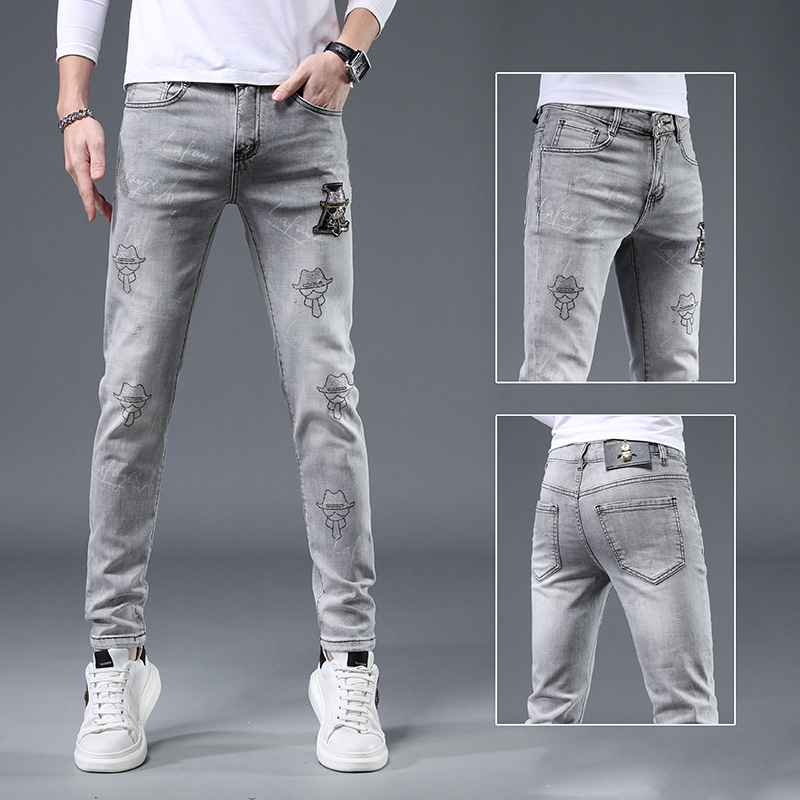 Jeans para hombre nueva tendencia en el verano de 2022 slim y casual marca Joker pantalones de pies grises de perforación caliente marea._voghion.com
