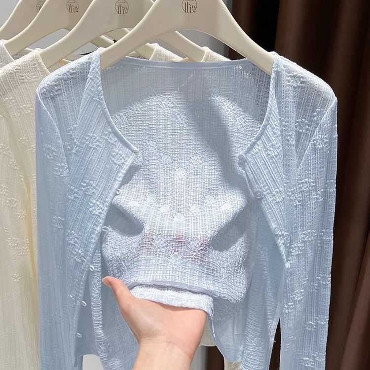 日焼け止めのジャカードのサスペンダーのスカートのカーディガンの外で夏の長袖の女性の薄い砂浜のショールを掛けて旗を合わせます。|undefined