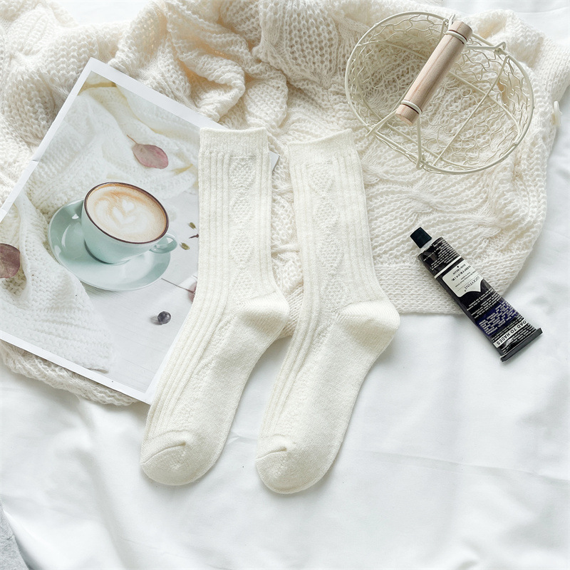 ウールの靴下の子供の秋冬の保温は厚いです。