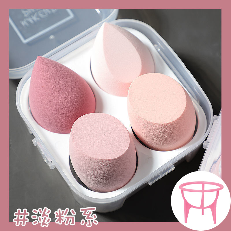 Venta directa de fábrica cáscara de huevo belleza huevo no comer polvo súper suave en caja soplo de polvo húmedo y seco de doble uso maquillaje esponja maquillaje huevo