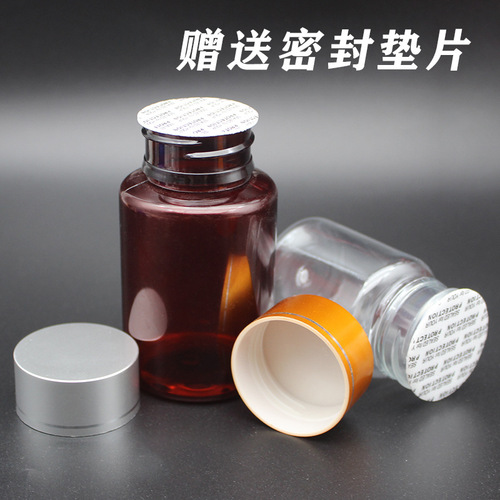 Wholesale 50 60 80 100g ml gold and silver cap sub-bottles transparent plastic bottles PET sealed bottles medicine bottles