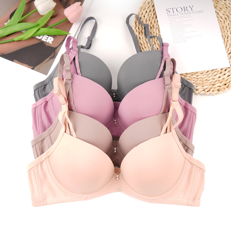 Fábrica de stock de ropa interior lisa sin marcas de pecho pequeño damas juntas sujetador de ajuste de soporte de la niñez sujetador del sudeste asiático
