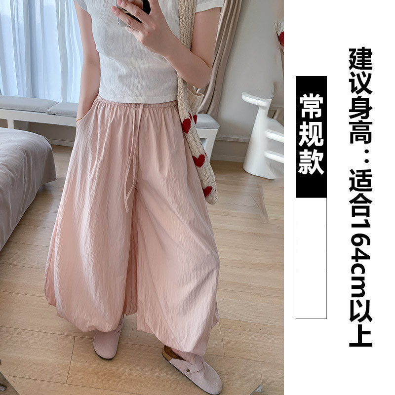 Pantalones de falda de capullo de flor de seda de hielo para mujer estilo fino de verano 2025 nuevo estilo casual perezoso pantalones de pierna ancha pequeños bombachos amarillos