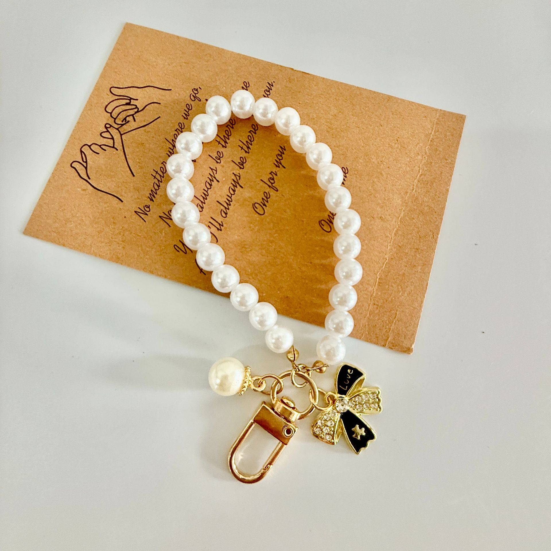Nuevo amor creativo pulsera llavero colgante colgante accesorios de perlas joyas rojas en línea al por mayor