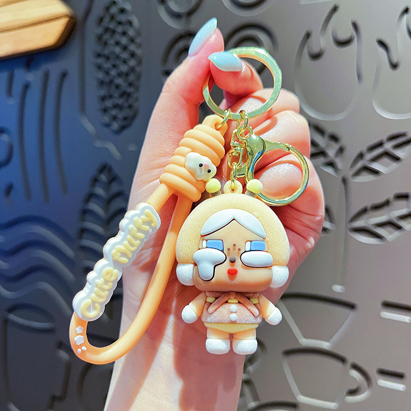 Nuevo llavero de bebé llorando, muñeca de lágrimas, bolso de muñeca, colgante, llavero de coche, colgante flocado de moda al por mayor