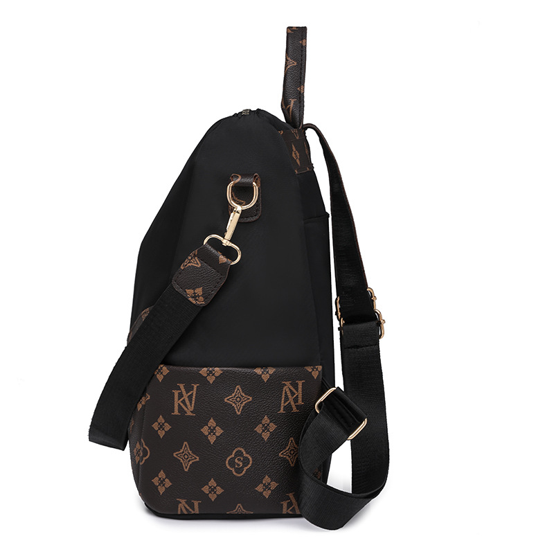 Comercio exterior al por mayor 2024 nueva moda europea y americana señoras mochila de nailon impresión color de contraste mochila de viaje de un solo hombro marea