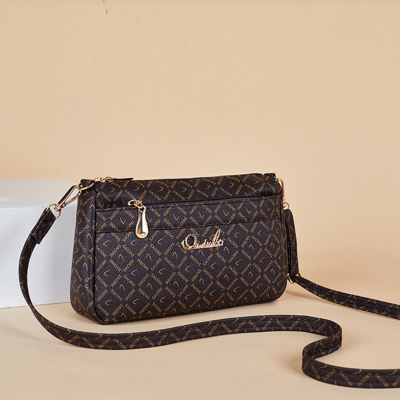 Guangzhou Hengli 2024 nuevo bolso de mensajero transfronterizo bolso casual de mediana edad bolso de teléfono móvil para mujer bolso de venta caliente bolso de hombro