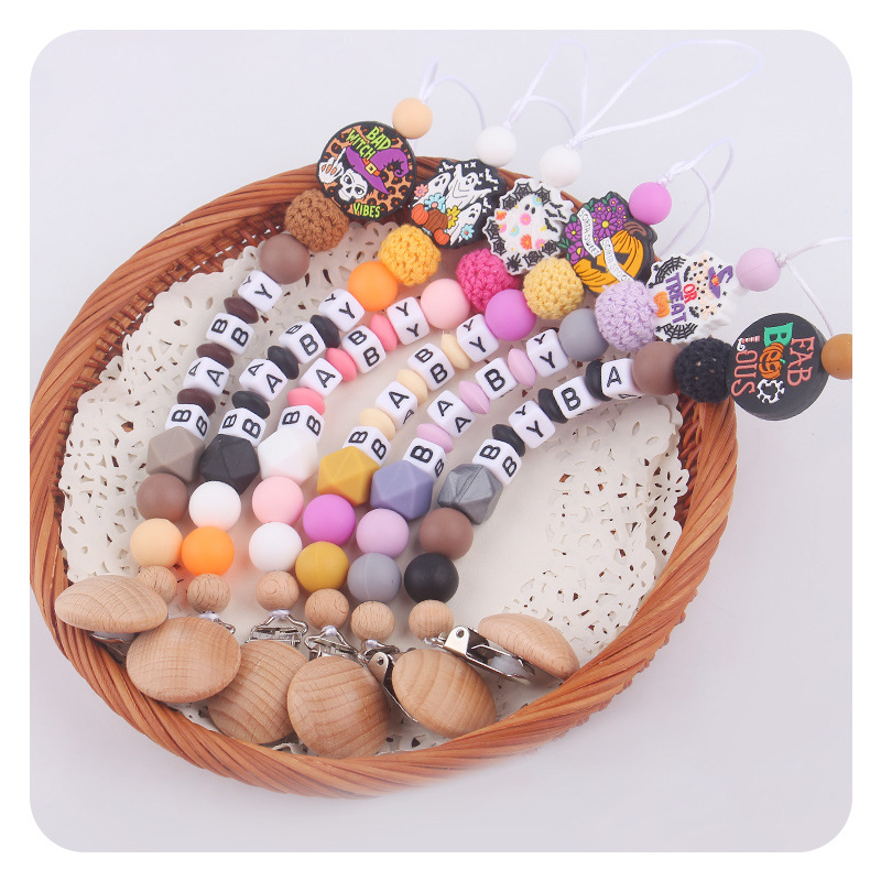 Productos para bebés, juguetes de planeta creativo, pinza de chupete de madera, cadena de chupete de silicona para bebés, cadena anti-caída