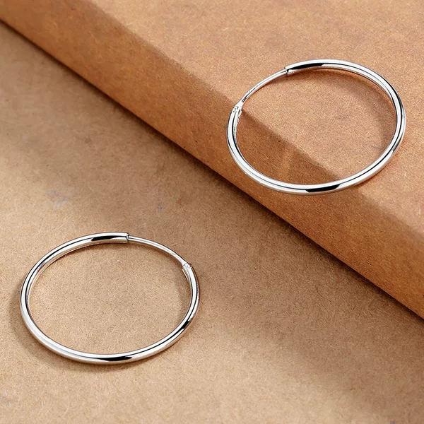 Cross-border hot sale European and American style simple exaggerated earrings simple fashion glossy earrings niche personality face-looking small earrings