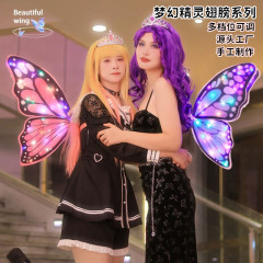 爆発的に光る蝶の背もたれの王女の電動の羽の精霊はダンスを動かしてパーティーの道具の結婚式の贈り物を演じます。