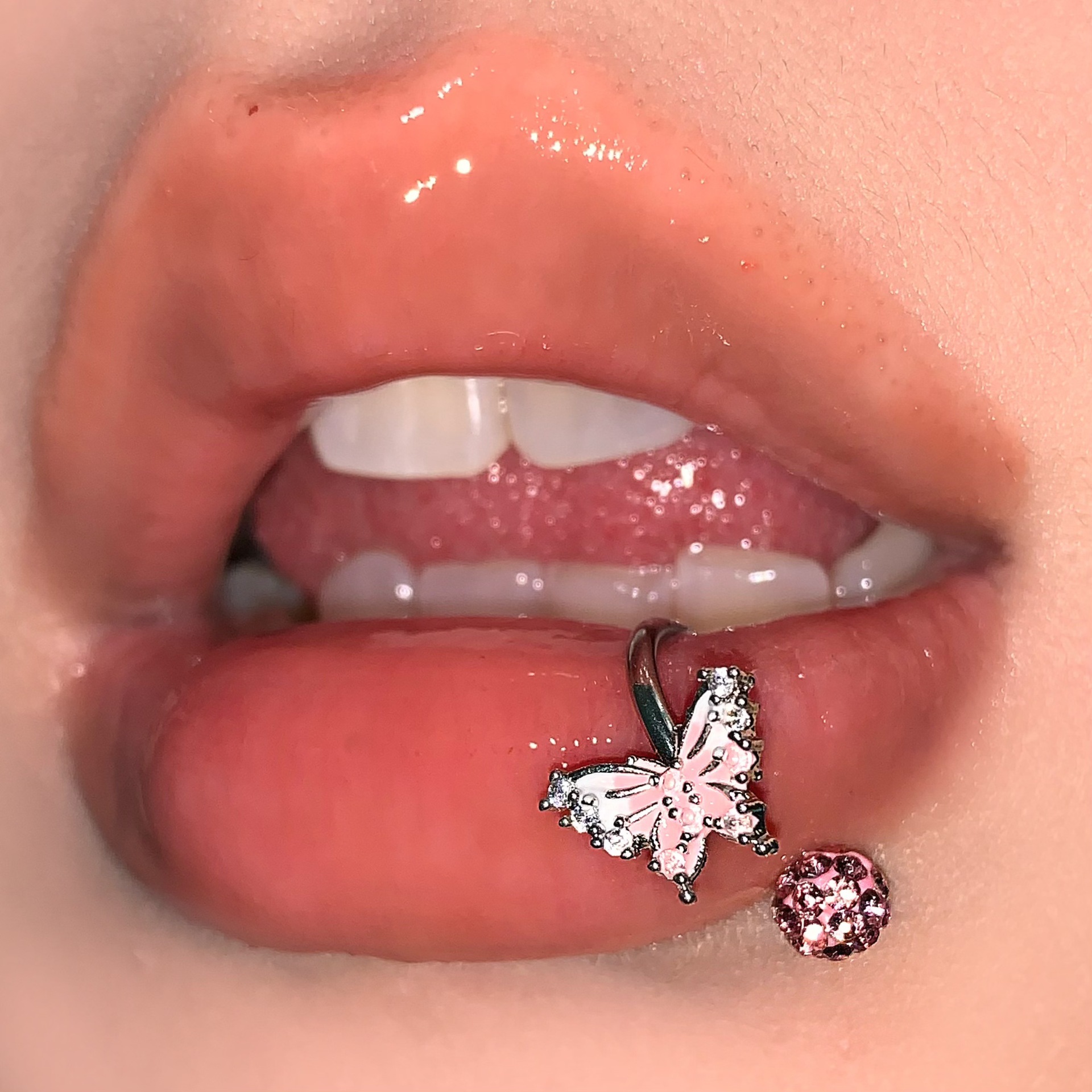 Silver pointed spike labret stud material detail