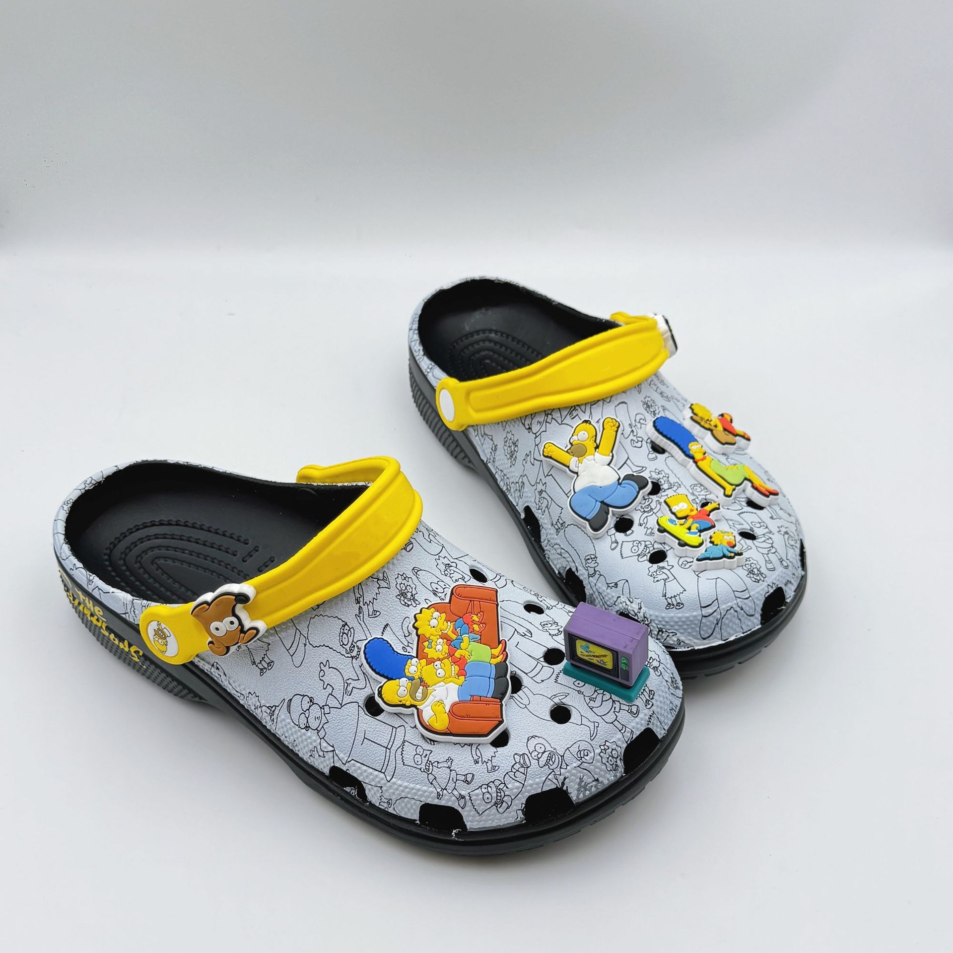 2025 nuevos zapatos agujero de cabeza de mono camuflado padre-hijo agujero zapatos transpirables al aire libre ocio sofá zapatos de playa moda