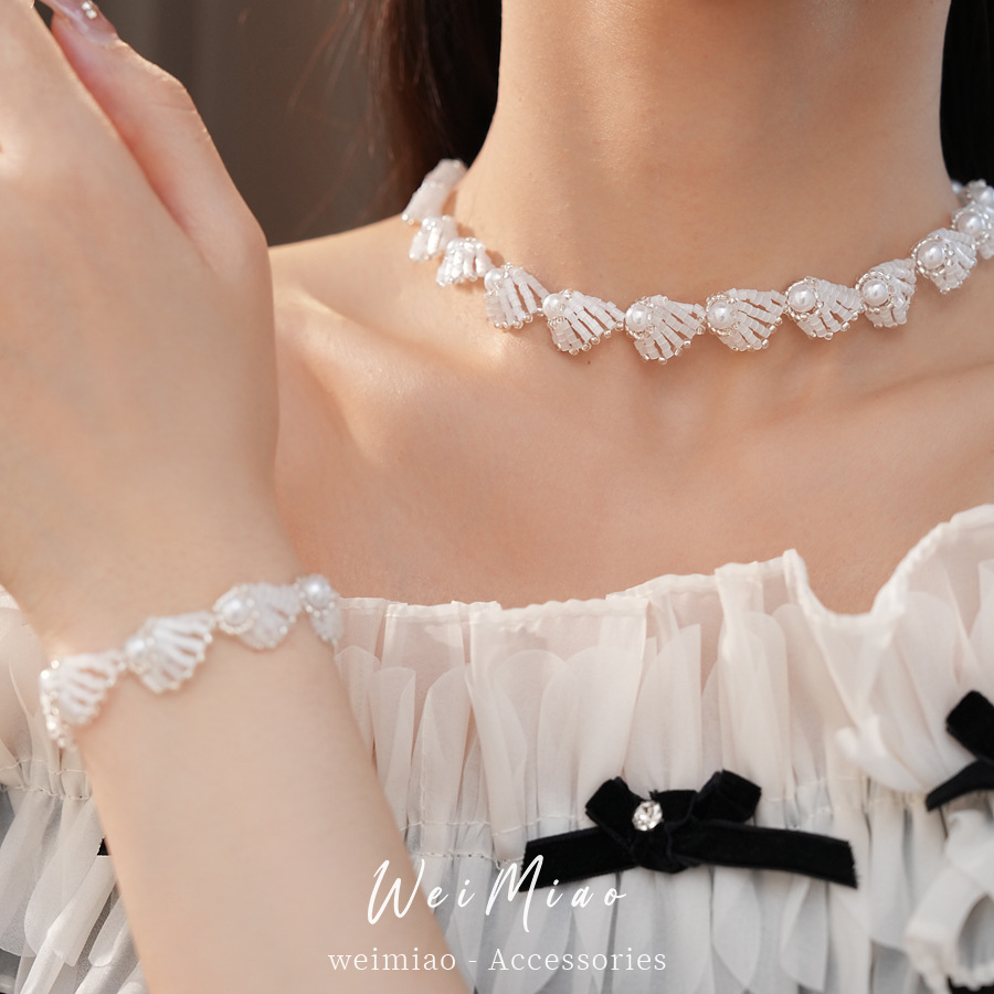 Temperamento retro collar de perlas de lujo ligero nicho de alta sensación de cadena de clavícula accesorios de vacaciones conjunto de joyería al por mayor