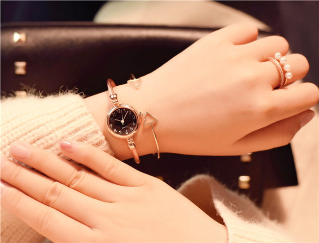 Cara digital-cara negra de oro rosa