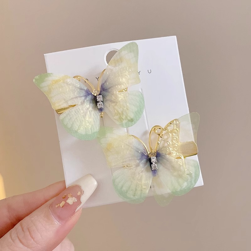 Horquilla de mariposa en movimiento horquilla de diamantes de imitación súper inmortal para niños 2025 nuevo clip de cabello roto lateral de niña accesorios para el cabello