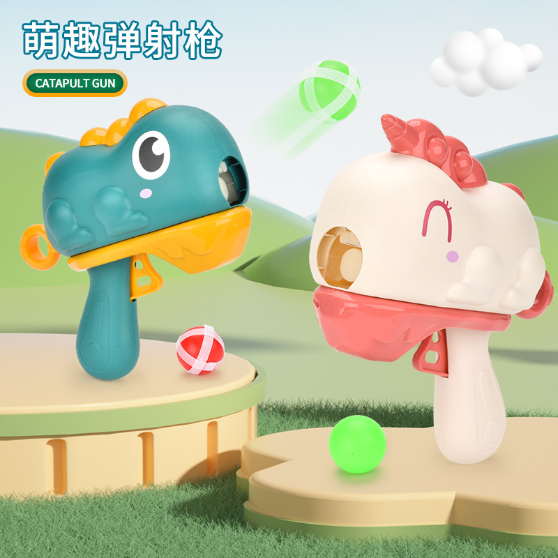 Interacción padre-hijo dibujos animados modelo de bolas de dinosaurio juguetes para niños bolas pegajosas pistola de catapulta puesta en barracas juguetes transfronterizos