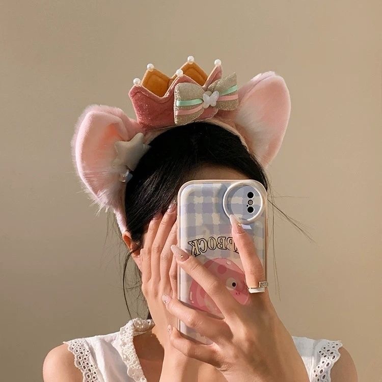 ピンクの蝶結びのベルの毛の耳のカチューシャの女性の高い頭の上のカチューシャは写真を撮って顔を洗って髪を押さえます。|undefined