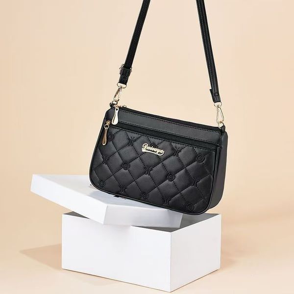 Capacious shoulder bag