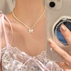 Cute fashionable necklace from pearl with bow, accessory