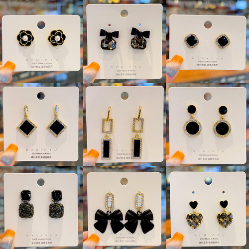 High-quality wholesale black silver needle earrings with micro-engraving design, niche light luxury series stud earrings, retro temperament earrings.