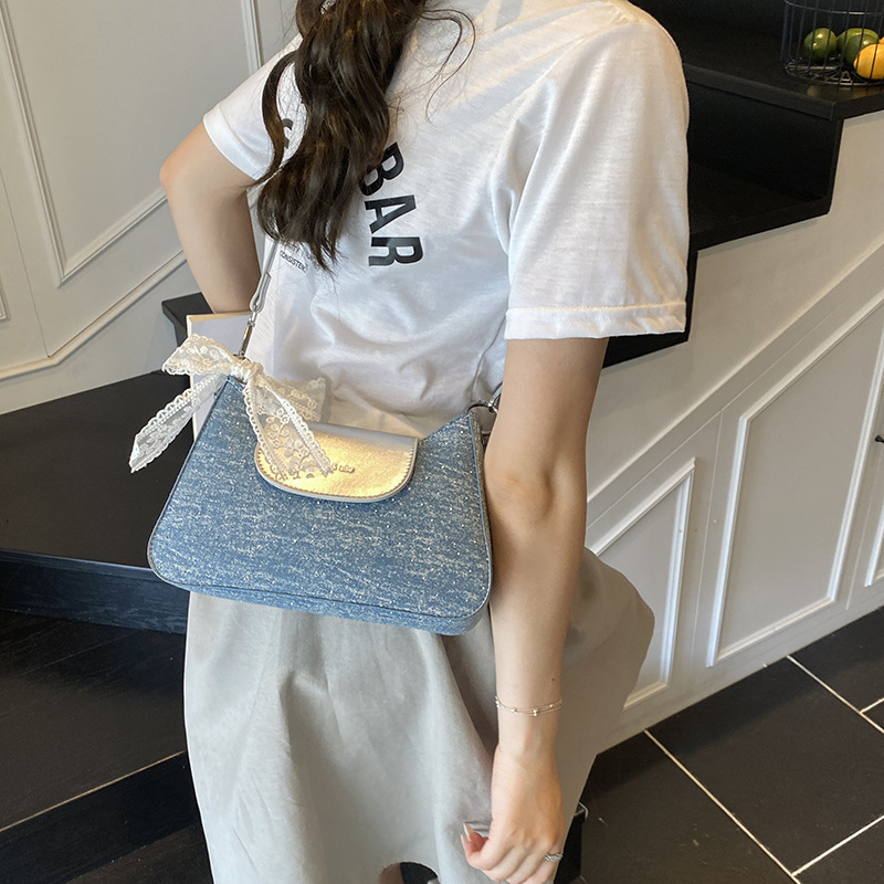 Bolso de moda coreano de estilo extranjero bolso de mano mujer 2025 verano nuevo bolso de brazo de denim bolso de viaje