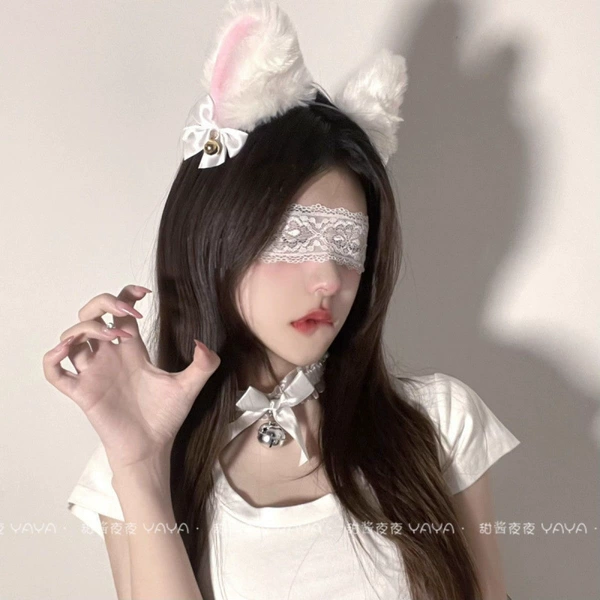 Small bell, white sleep mask, necklace
