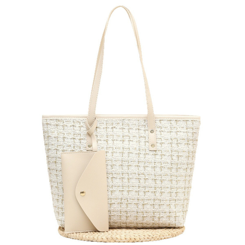 2025 nuevo bolso de cubo de tela de tela de mano de mujer alta calidad bolso de hombro de moda temperamento universal nicho bolso de mochila